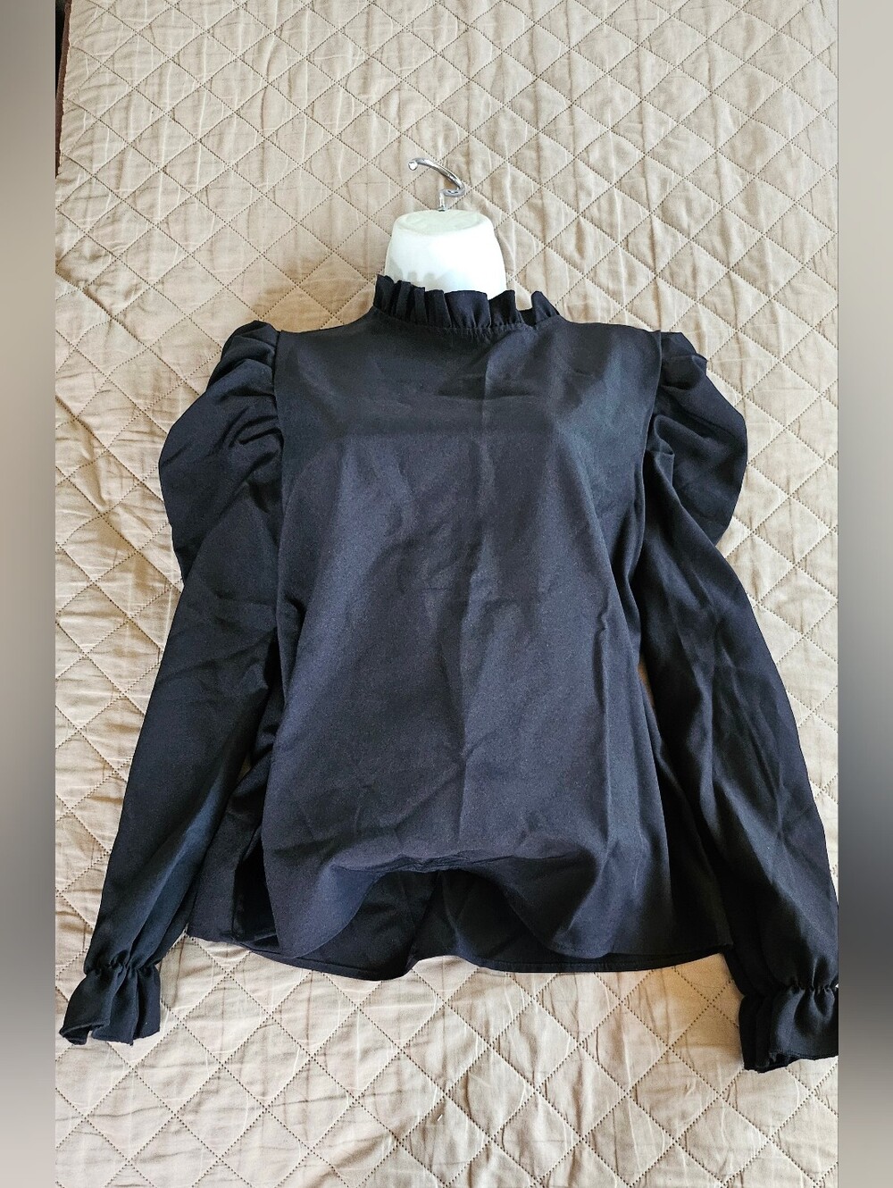 Black blouse, ruffled necklace and sleeve ends. Women size small